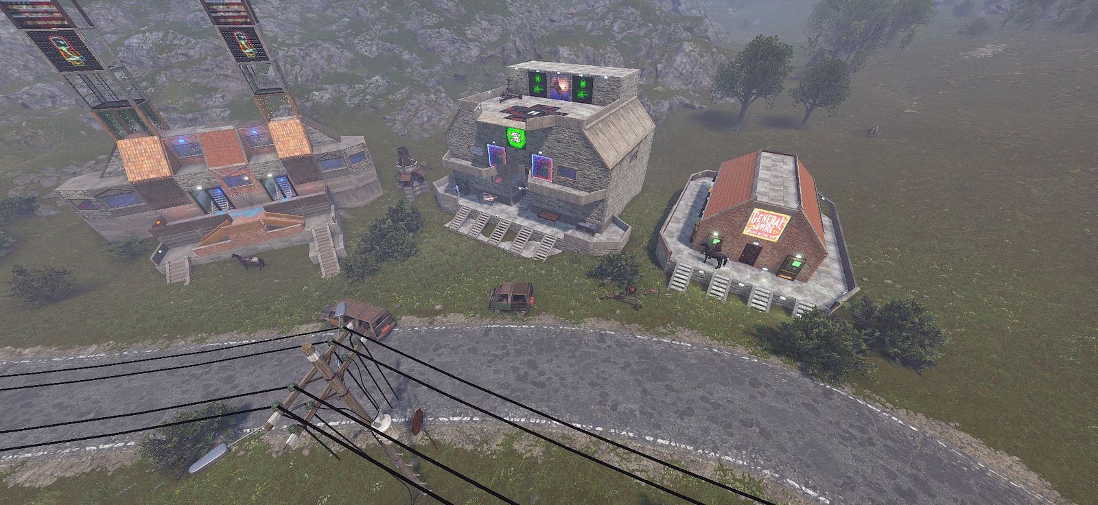 A player-built roleplay town by the road: a twin-tower building, a stone hall with a rooftop helipad and a brick General Store, with cars and horses outside