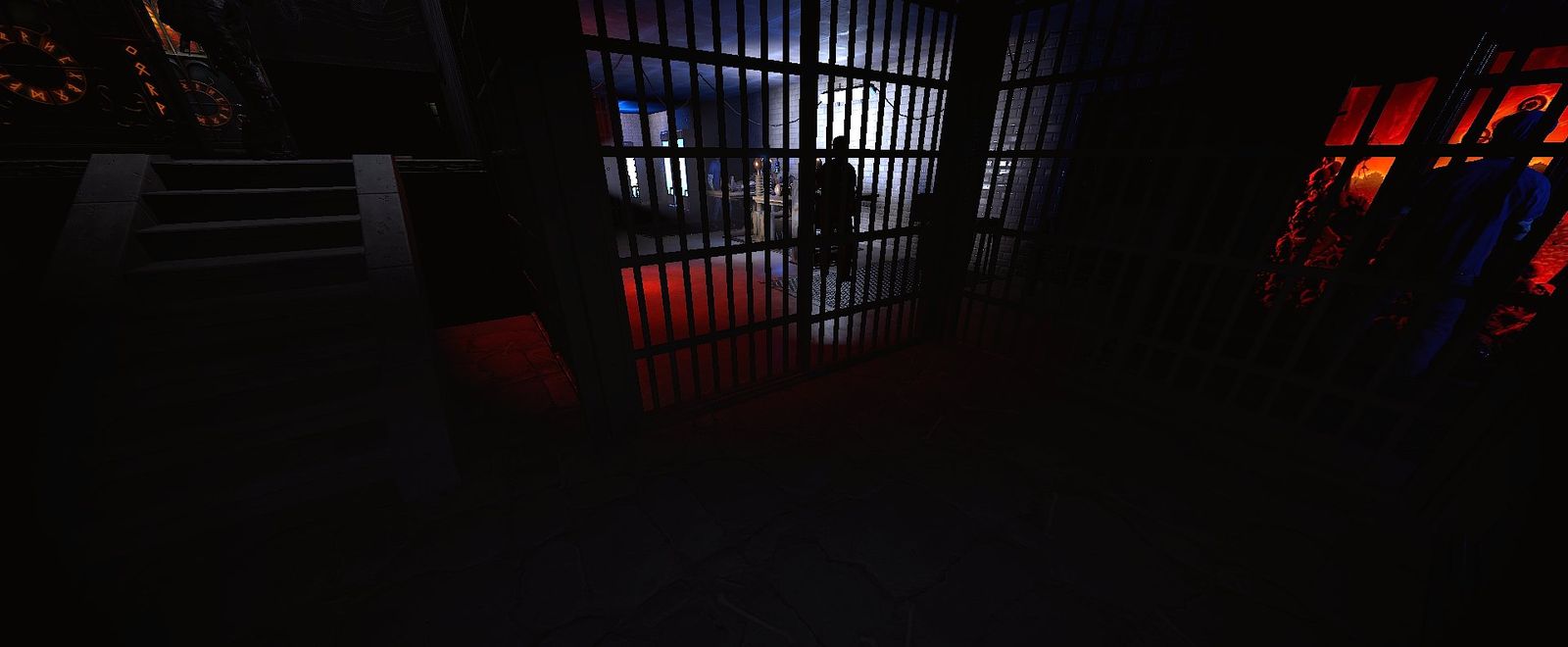 A figure standing inside a lit cell, seen through iron bars