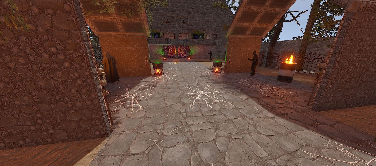 Halloween factory courtyard with cobwebs, bones, cauldrons and NPC guards