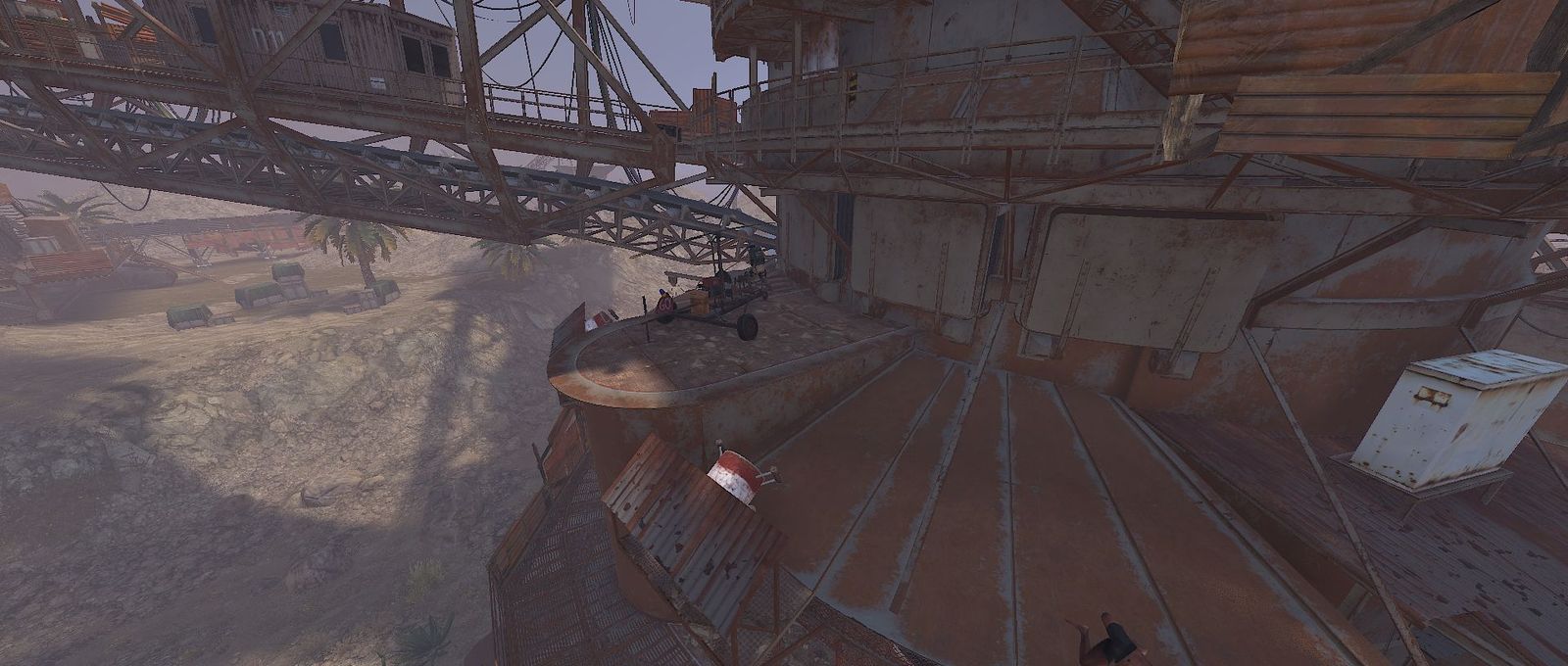 A player landing a minicopter on the Giant Excavator monument while looting it