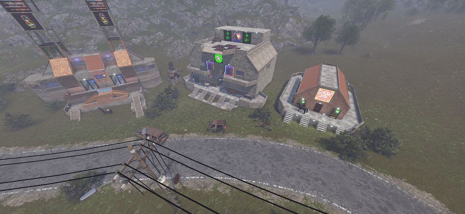 A player-built town seen from above, with a helipad on the roof
